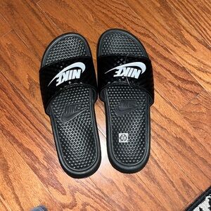 Black Nike slides